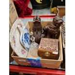 A pair of Eastern carved wood dogs, an Eastern carved wooden box containing various costume