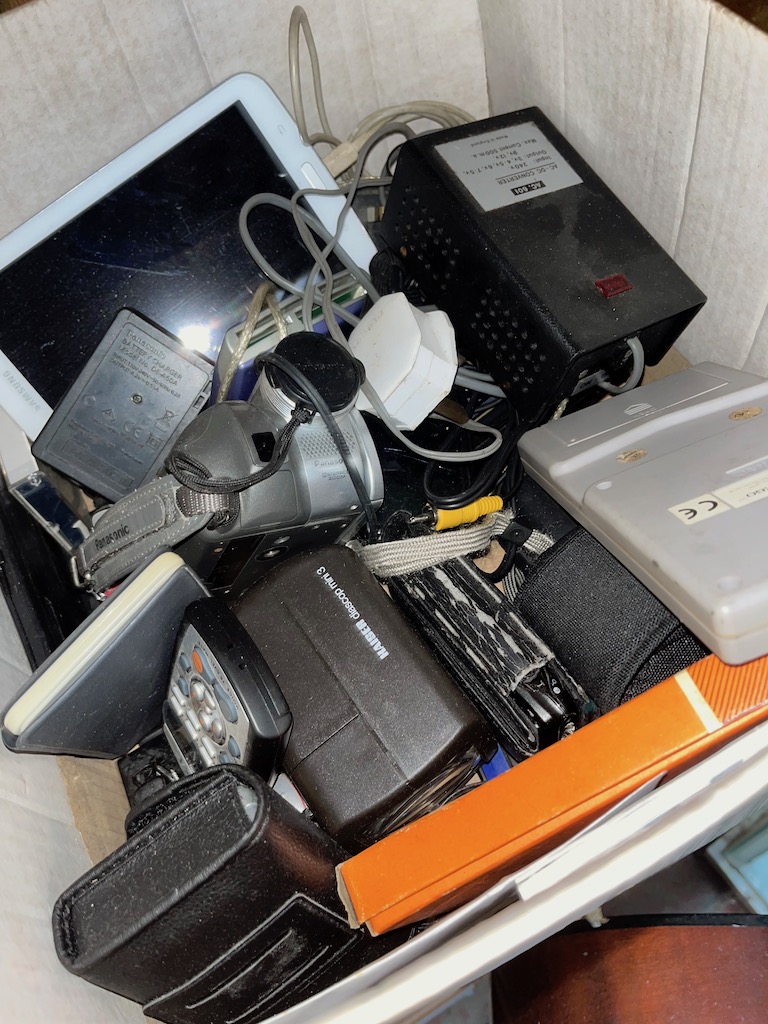 A box of mixed electricals, games, cameras etc.