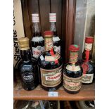 Six bottles of alcoholic beverages to include Grand Marnier, Drambuie, Pimm's and a Glenfiddich malt