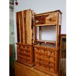 Two small pine chests of drawers, a hardwood side table and a hardwood coffee table.