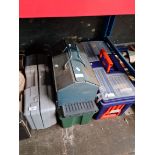 A box of tools, 2 toolboxes with contents and a boxed trolley jack.