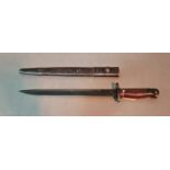 A WW2 short magazine Lee Enfield bayonet, 16 3/4" long, with scabbard, blade stamped N.W.R.