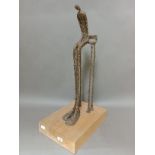"Sorrow" - composite and wire figure of a man sitting, after Alberto Giacometti, 70cm height, on