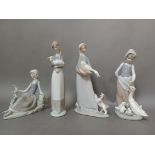 Four Lladro figures.