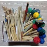 A collection of drum beaters, drum sticks, brushes, wooden flute, etc.