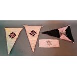 Three reproduction German WW2 car flags together with a Jewish armband.