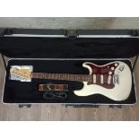 A 2011 Fender Stratocaster, American made, serial no. US11278773, cream body with faux tortoiseshell