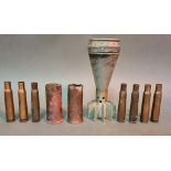 A collection of WW1 shells found in North East France together with a mortar casing.