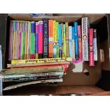 A box of children's books / annuals.