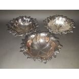 A set of three WMF silver plated frite bowls, diameter 26cm.