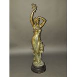 A French bronzed spelter figure depicting a female figure after Theophile Somme (1871 - 1952), on