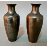 A pair of Chinese bronze Shih So "turnip shaped" vases with a silver encrusted garden scene,