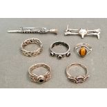 Five hallmarked silver rings, different settings to include tiger's eye, onyx, etc. together with