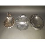 A group of three Art Nouveau silver plated dishes.