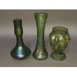 A group of three Kralik irridescent green glass vases, tallest 25cm.