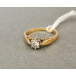 A hallmarked 18ct gold diamond solitaire ring, size L/M, gross weight 2.9g.