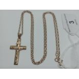 A 9ct gold chain with cross pendant, gross weight 5.70 grams.