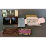 A mixed lot of smoking items including a tin of 1920s Pera cigarettes, stacking Bakelite ashtrays,