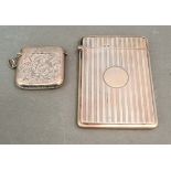 A hallmarked silver card case, Birmingham, Henry Matthews, 1912 and a hallmarked silver vesta