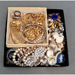 A tray and a Monet box containing various costume jewellery to include Swarovski, silver, etc.