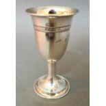 A hallmarked silver goblet with gilt interior, Birmingham, W I Broadway & Co, 1983, gross wt. 1.6