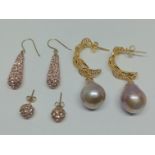 Two pairs of 9ct gold and CZ earrings together with a pair of gilt silver baroque pearls earrings.