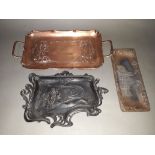 Three Art Nouveau metal dishes/trays comprising a cast iron dish, a WMF tray and another.