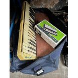 A vintage accordion by Pietro (as found) together with a boxed Stylophone