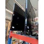 Two 40" Samsung TVs with remotes.