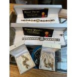 Two boxed Marcel Drucker ladies watches (USA) plus a boxed Aurora bracelet and matching necklace