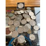A selection of coins to include 50p, George VI, US Dollars etc.
