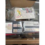 Stamps - album of 25 presentation packs and more than 50 first day covers