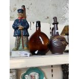 Three vintage decanters, including Keystone Whisky, a 1978 KLEM Dutch style Italian decanter and a