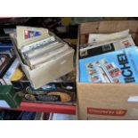 2 boxes of stamp albums, covers and catalogues and a box of various PHQ's