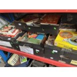 4 boxes of miscellaneous books and games