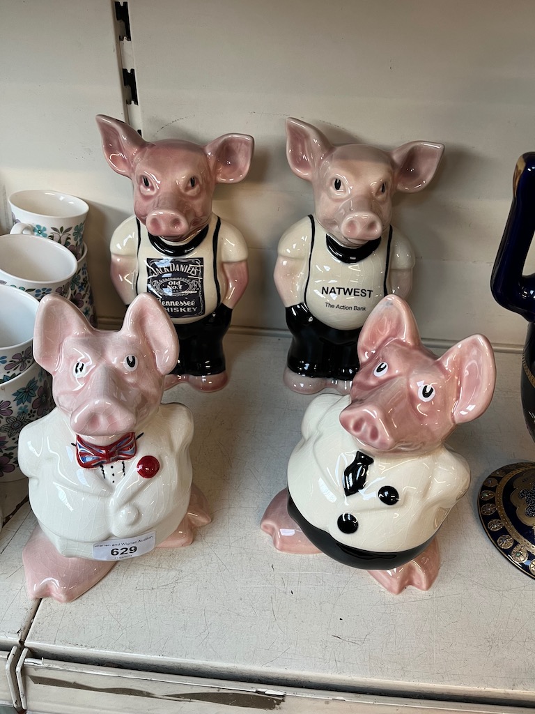 2 large and 2 small Wade Heath money box pigs with Nat West stoppers - one large one wearing shirt