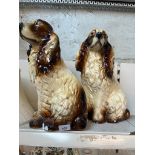 A pair of plaster spaniel figures, height 41cm.