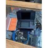 Nintendo DS Lite with case and charging cable. Nakiworld games carrying case (no games)