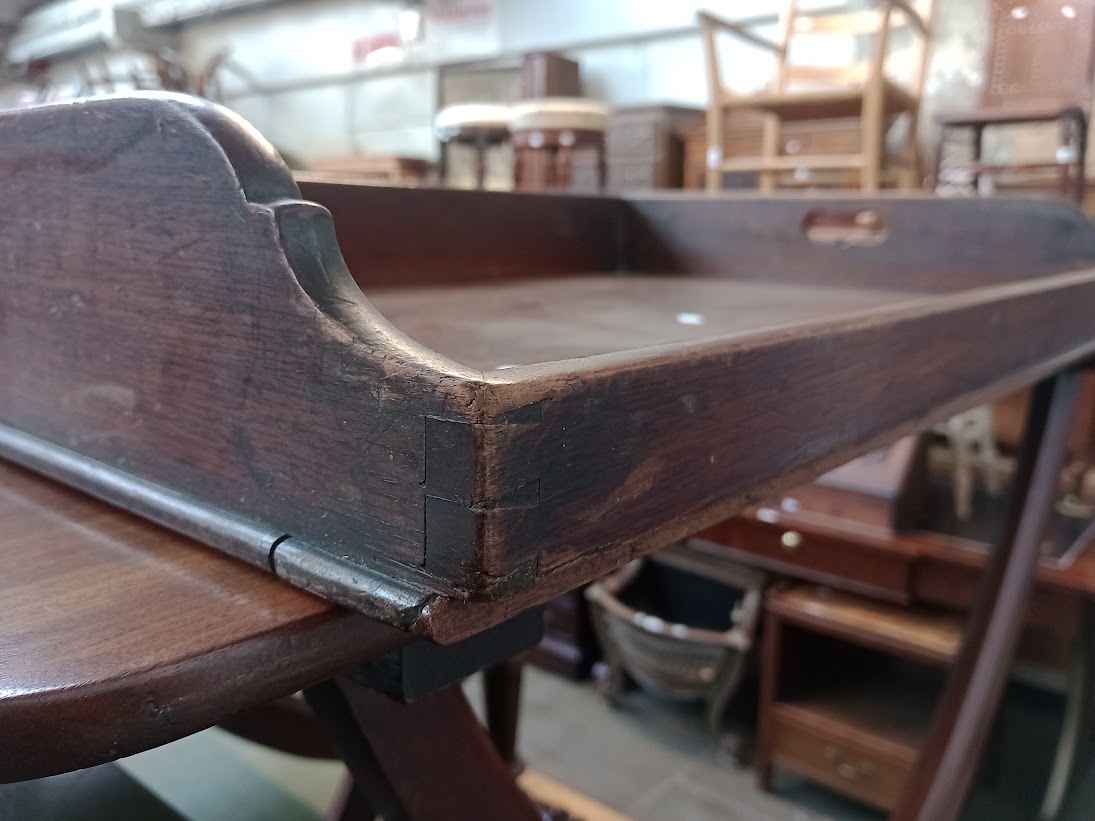 A Georgian mahogany butler's tray with folding stand and an Edwardian folding table. - Image 4 of 5