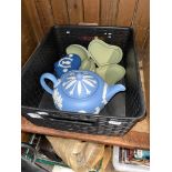 Four pieces of Wedgwood Jasperware comprising teapot and three lidded dishes.