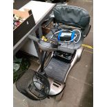 A Shoprider mobility scooter, with charger and key - untested, sold without any guarantee.