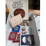 A box of assorted coins and bank notes including crowns, sixpences, thruppeny bits, pound notes