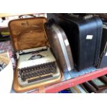 Three portable Typewriters