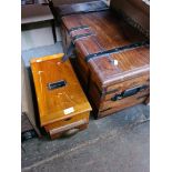 An old wooden cash till / register and a metal banded wooden box.