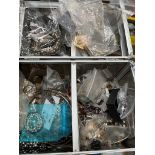 A case of assorted costume jewellery, vintage and modern, bracelets, earrings etc.