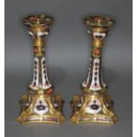 A pair of Royal Crown Derby Imari candlesticks pattern 1128, height 27cm.