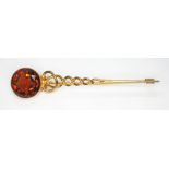 A Scottish provincial kilt pin, early 20th century, of twist form and terminating with a