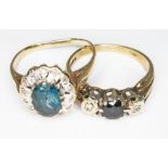 Two hallmarked 9ct gold rings: a topaz and diamond cluster and a diamond and sapphire ring, gross