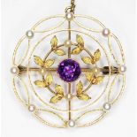 An early 20th century pearl and amethyst brooch, diameter 30mm, marked '15ct', gross wt. 5.3g.