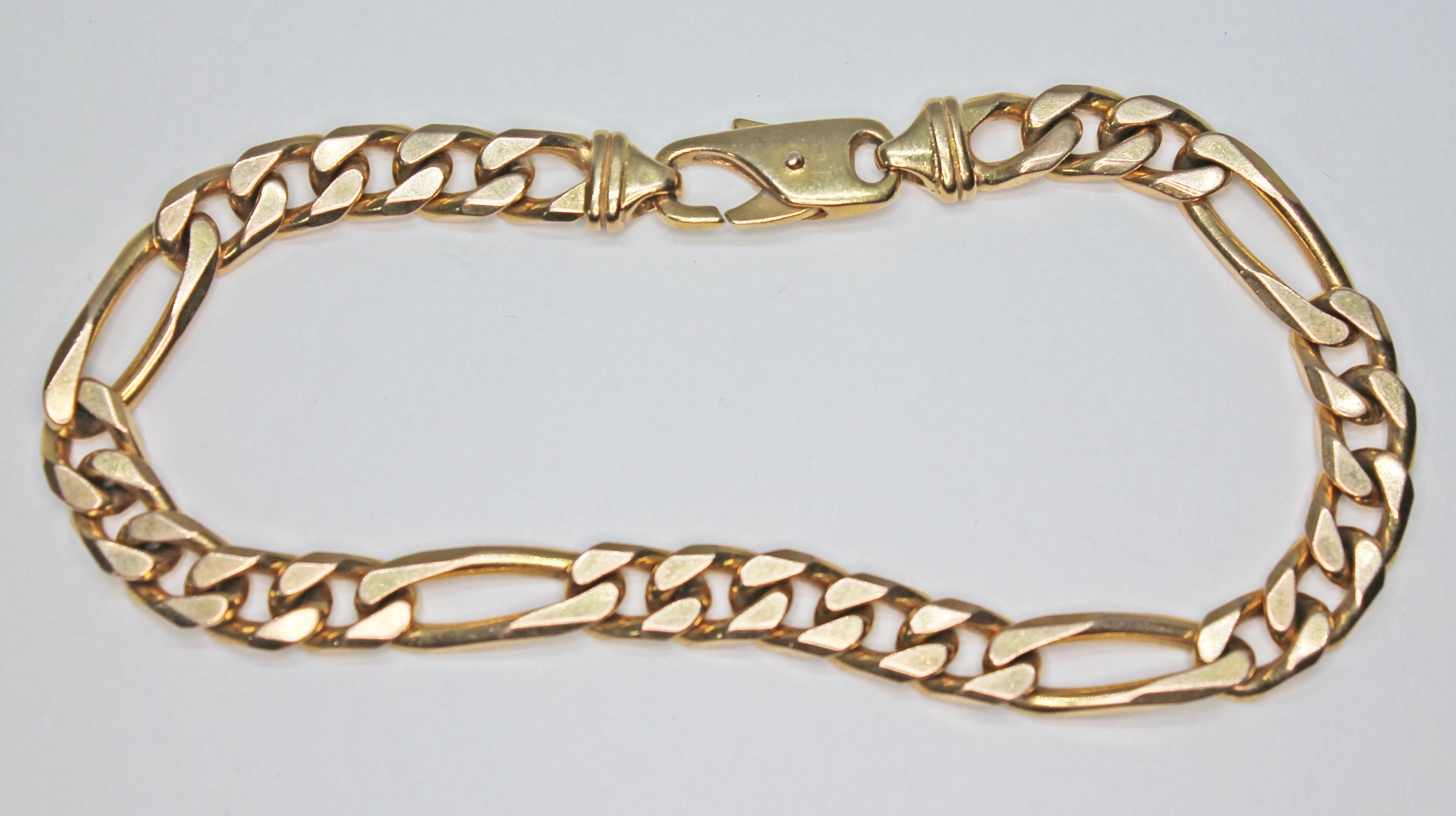 An Italian 9ct gold flat link bracelet with lobster claw clasp, 9ct gold import marks, length